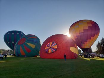 Hot air balloons against clear sky