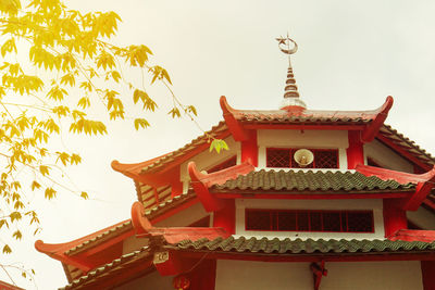 Low angle view of pagoda against sky