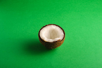 Directly above shot of lemon slice over white background