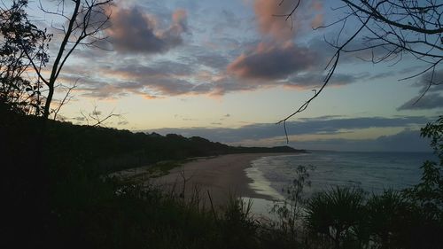 Scenic view of sea against cloudy sky