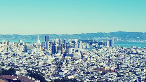 View of cityscape against clear sky