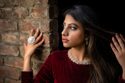 Portrait of young woman drinking coffee