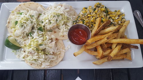 Close-up of food served on table