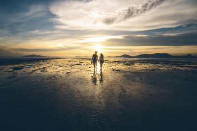 Scenic view of sea at sunset