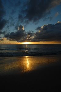 Scenic view of sea against sky at sunset