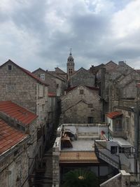 Low angle view of buildings in city against sky