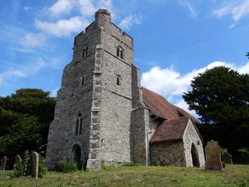 Low angle view of old building against sky