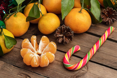 High angle view of orange fruits on table