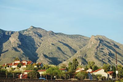 Scenic view of mountains against cloudy sky