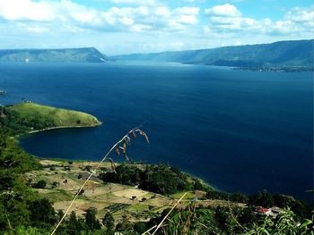 High angle view of bay against sky