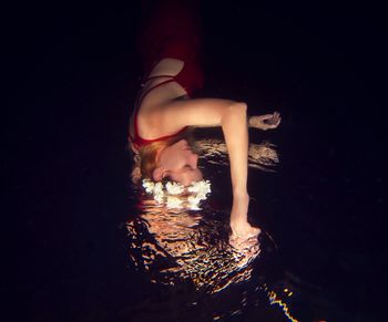 Reflection of woman in water