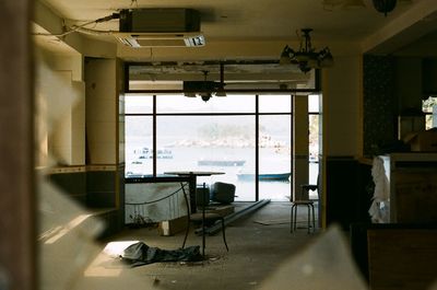 Empty chairs and tables in restaurant