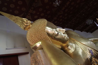 Low angle view of buddha statue