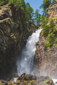 Scenic view of waterfall in forest