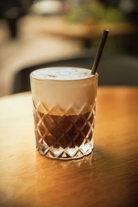 Close-up of coffee cup on table