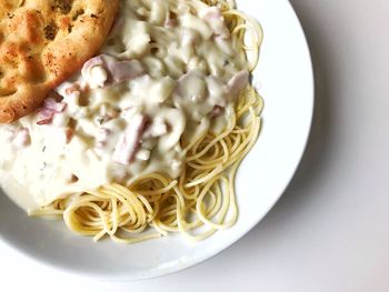 High angle view of noodles in plate on table