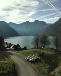 Scenic view of lake against cloudy sky