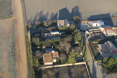 High angle view of buildings and houses in city