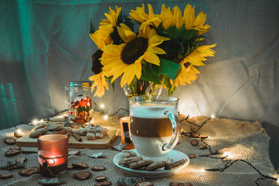 Close-up of sunflowers on table at home