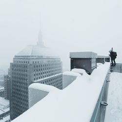 View of buildings in city during winter