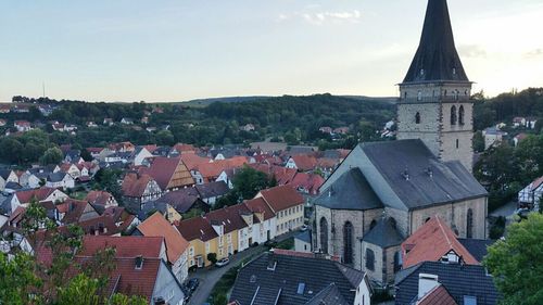 Aerial view of city against sky