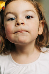 Close-up portrait of cute girl