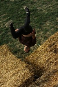 Woman standing on grassy field