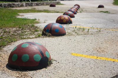 Close-up of multi colored ball on road