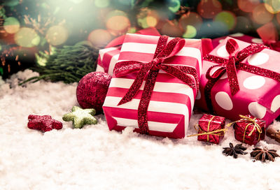 High angle view of christmas gifts on snow