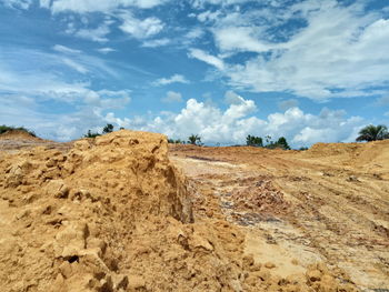 Panoramic view of desert against sky