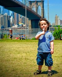 Portrait of a young boy in city