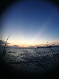 Scenic view of sea at sunset