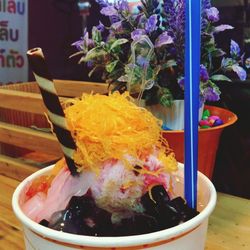 Close-up of candies in bowl on table