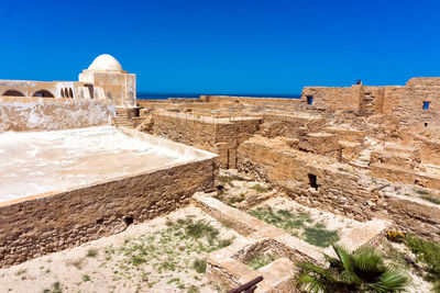 View of fort against blue sky