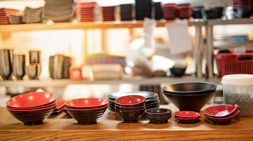 Close-up of tea cups on table