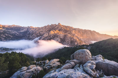 Scenic view of rocky mountains against sky