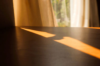 Sunlight falling on table at home