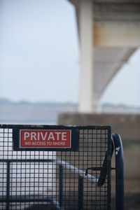 Private sign on railing