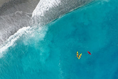 High angle view of people in sea