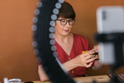 Young woman using mobile phone