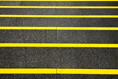 Full frame shot of yellow marking on street
