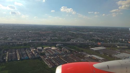 Aerial view of city against sky