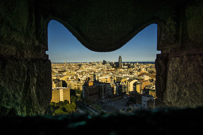 Buildings in city against sky