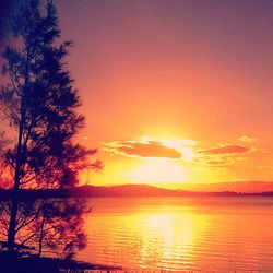 Scenic view of sunset over lake