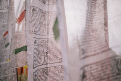 Close-up of text on paper at temple