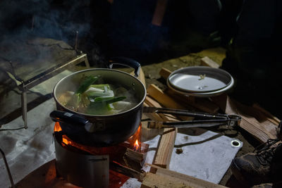 Cooking pot on the fire at night