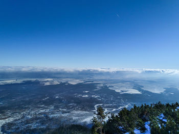 Scenic view of landscape against clear blue sky