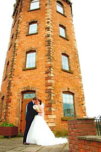 Low angle view of person standing in front of building