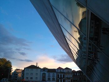 Low angle view of modern buildings against sky