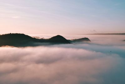 Scenic view of cloudscape against sky at sunset